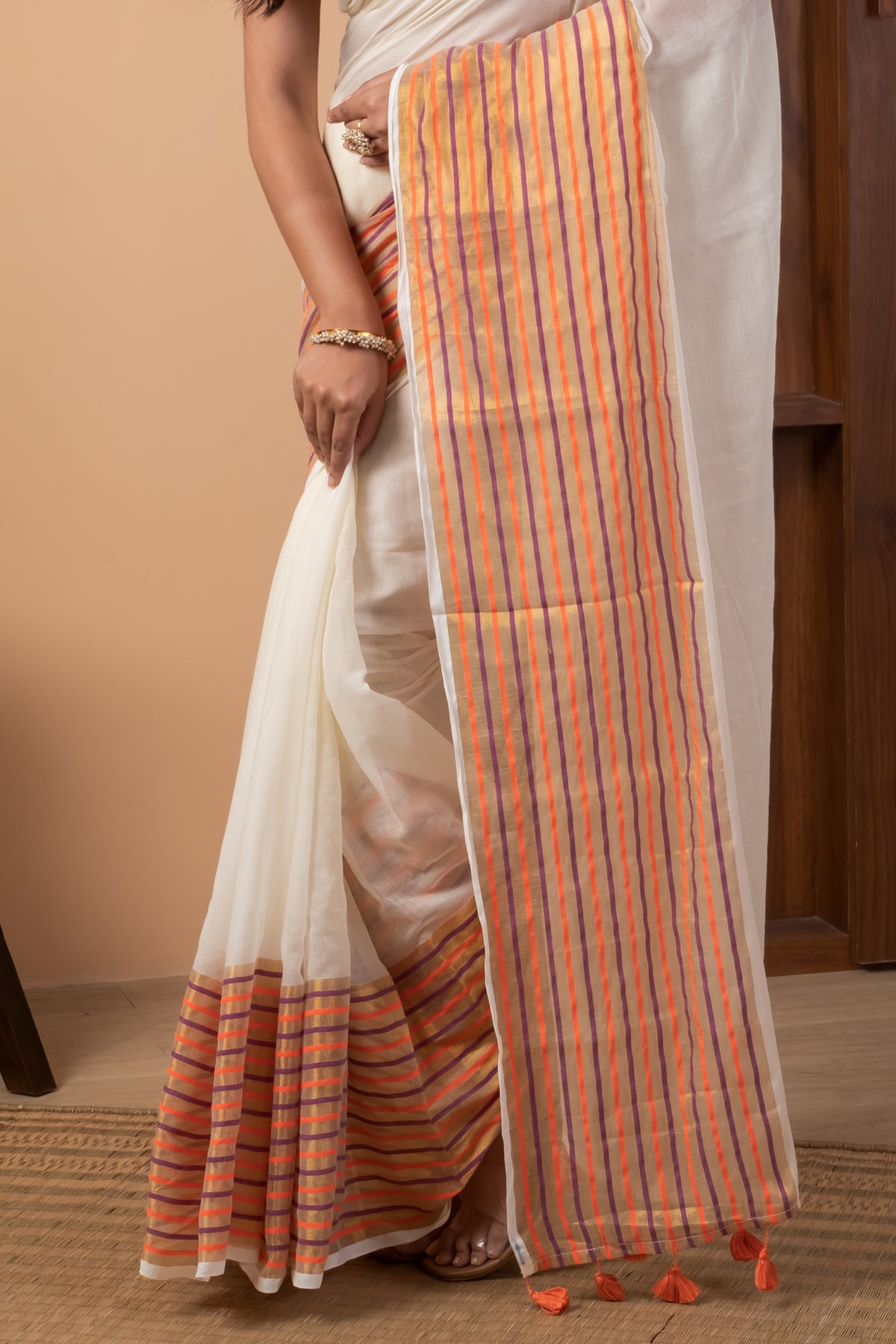 Ivory White Saree with Contrast Orange Golden striped Zari Border