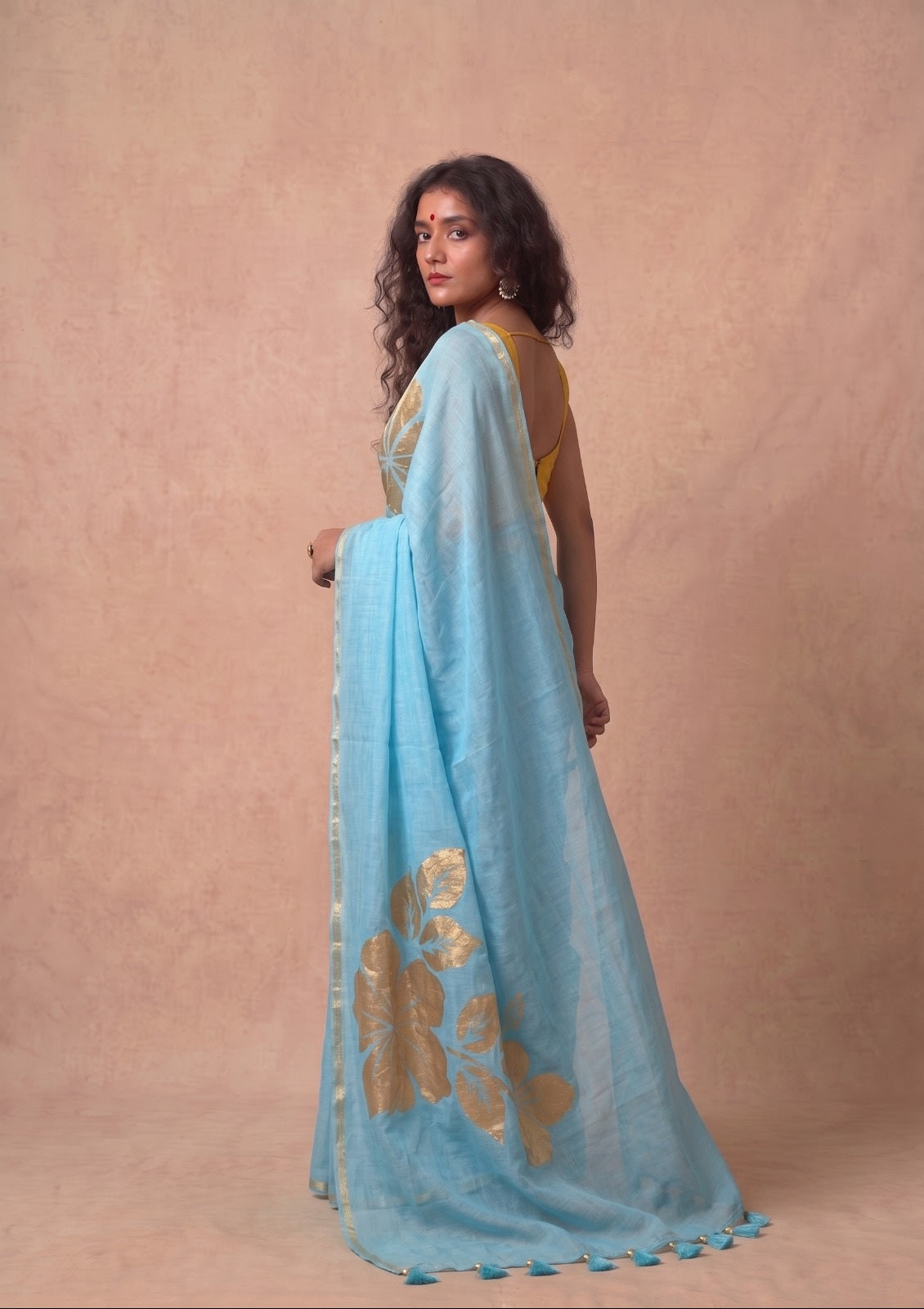 Golden flower sky blue mulmul cotton saree