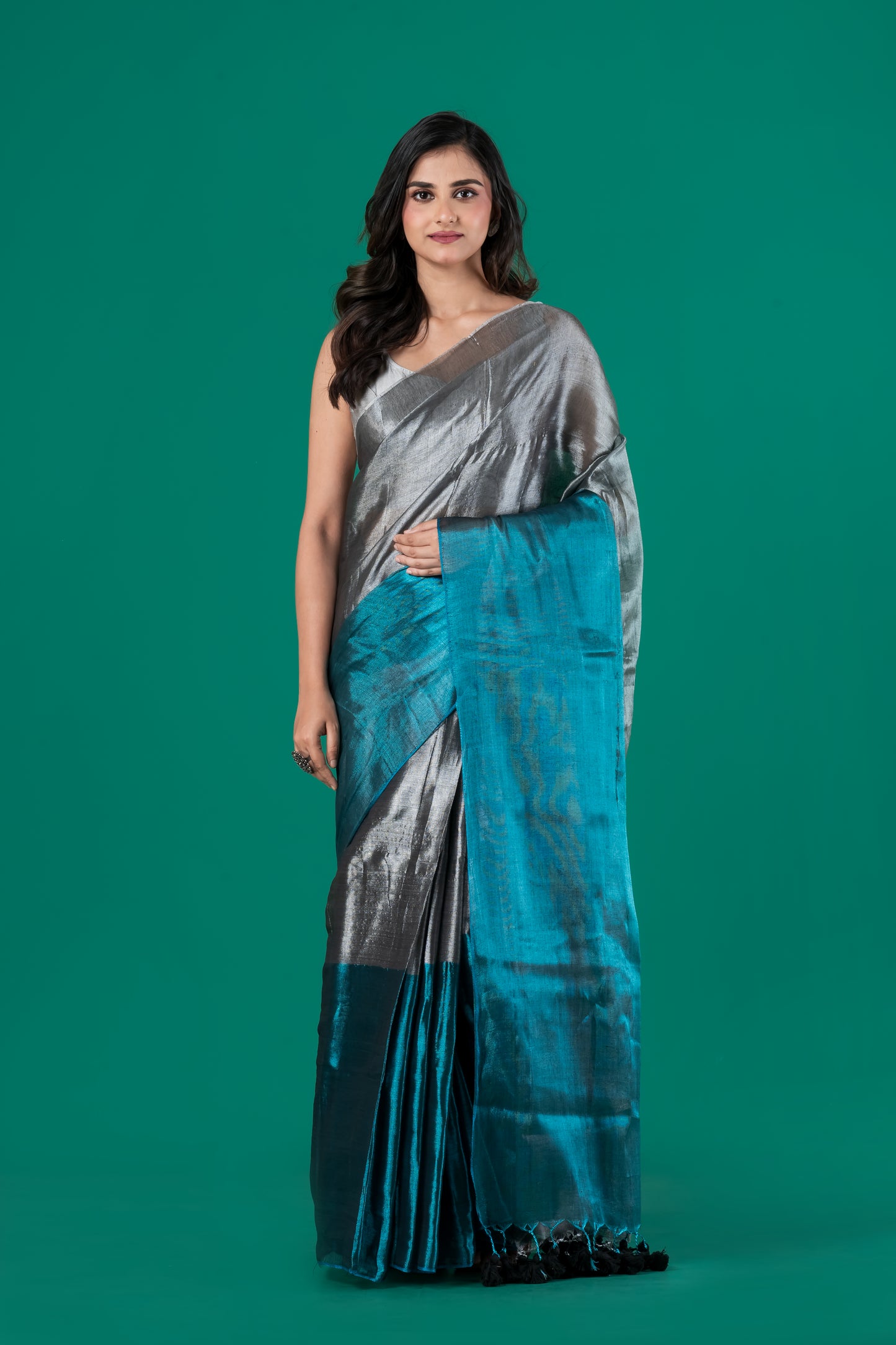 Metallic silver meets teal in Tissue cotton saree