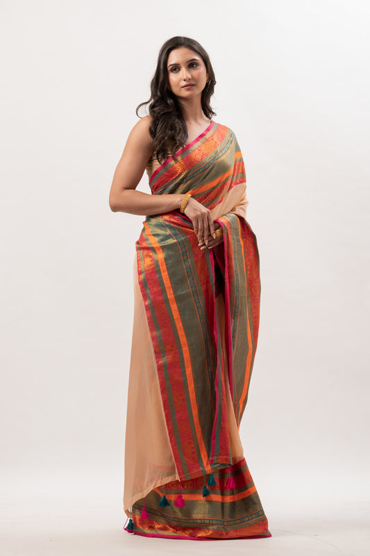 Deep beige mul cotton saree with vibrant green n orange kanchi border