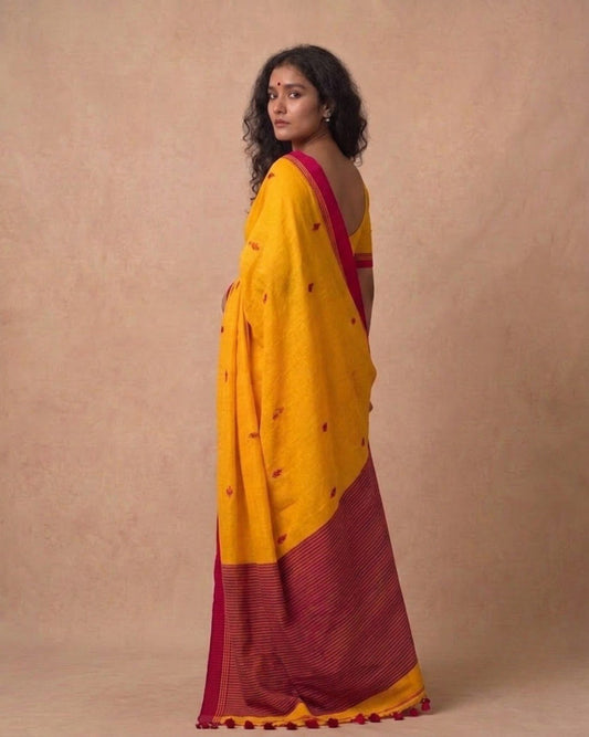 Mustard yellow handspun cotton saree with red bootis