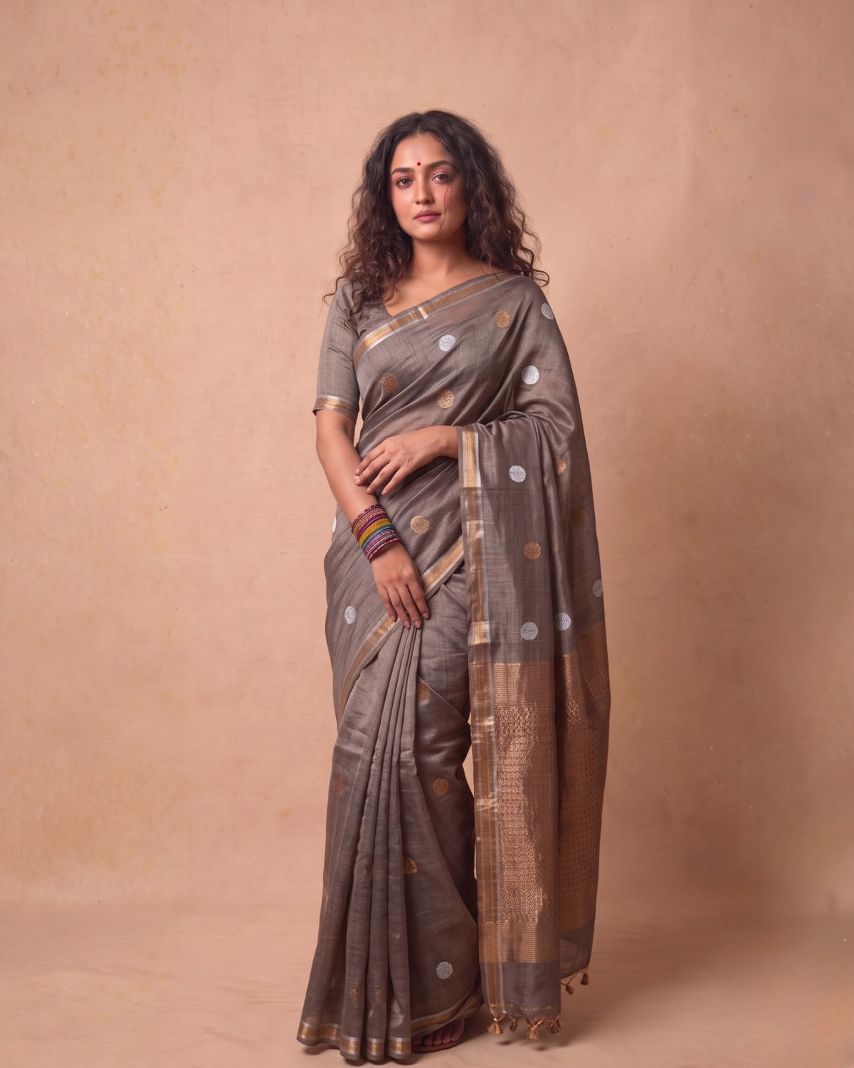 Tissue Tussar Saree in Deep Grey with Zari Border & Tassels