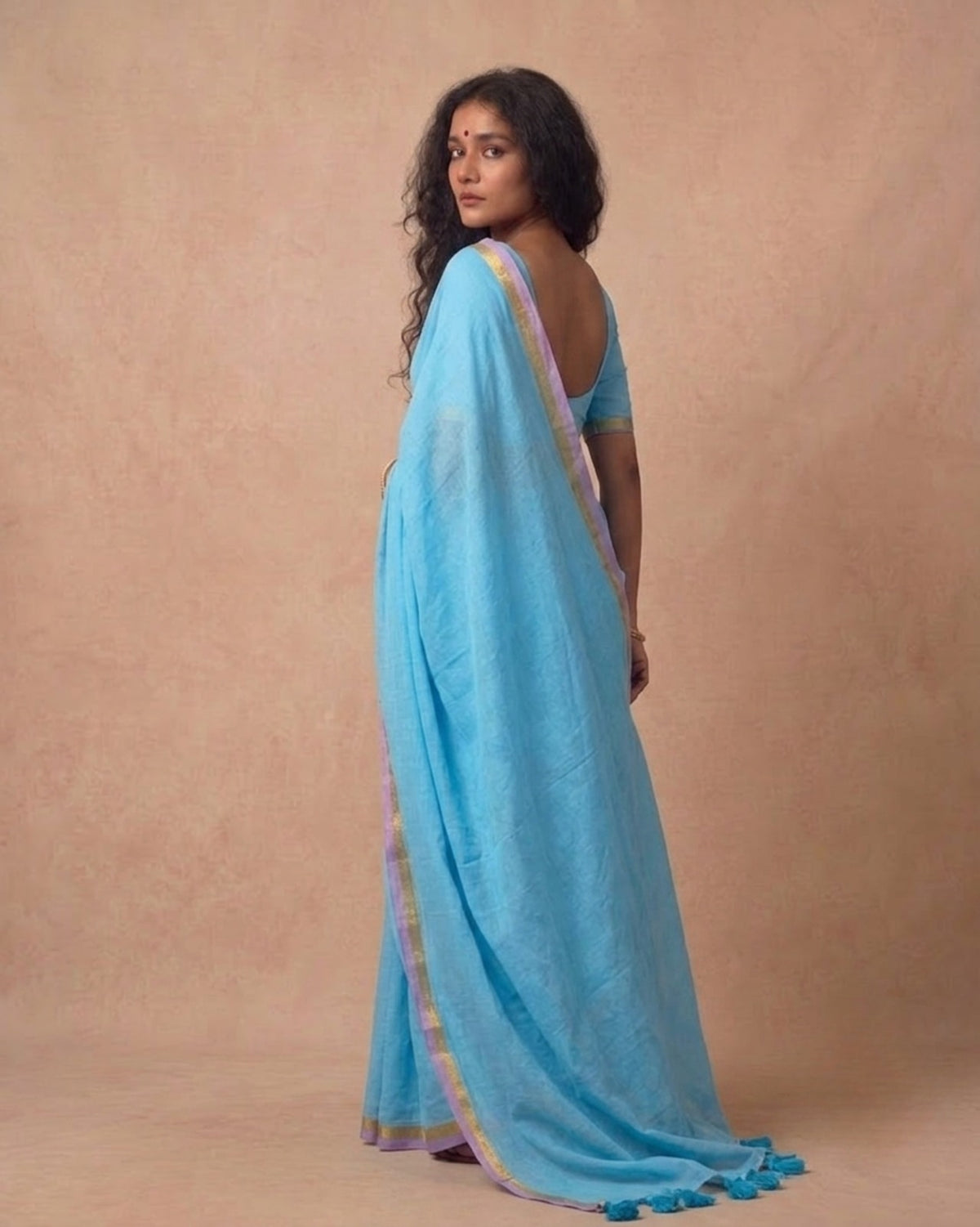 Sky blue mulmul cotton saree with subtle zari border