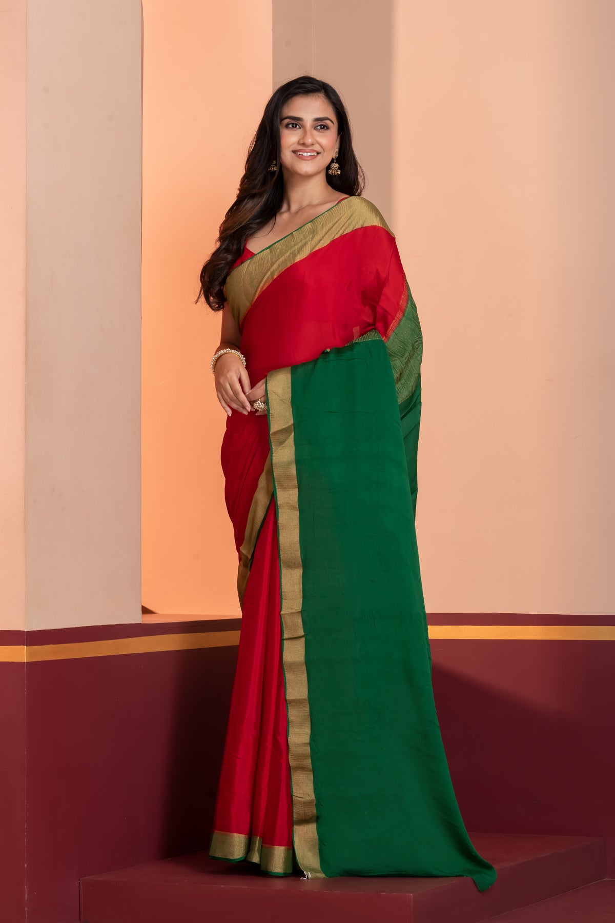 Bright red pure crepe silk zari border saree