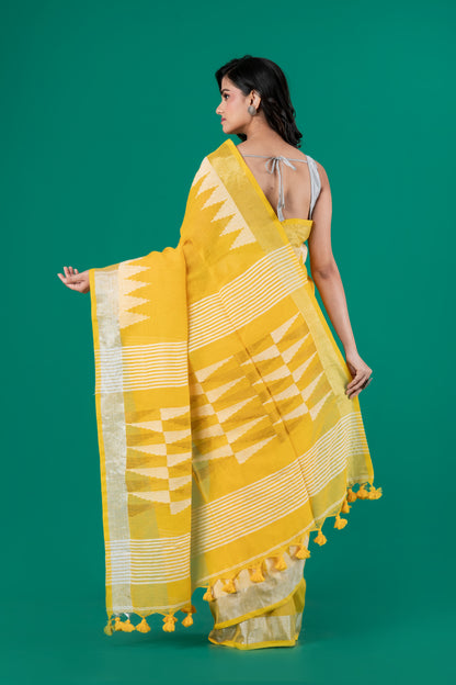 Bright yellow linen saree temple borders