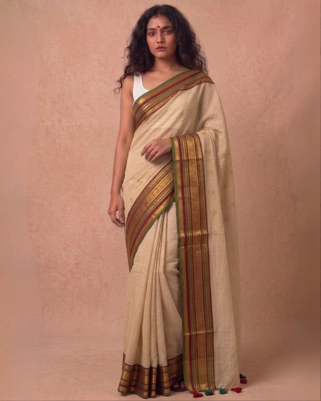 Off white multi color kanchi border mulmul saree