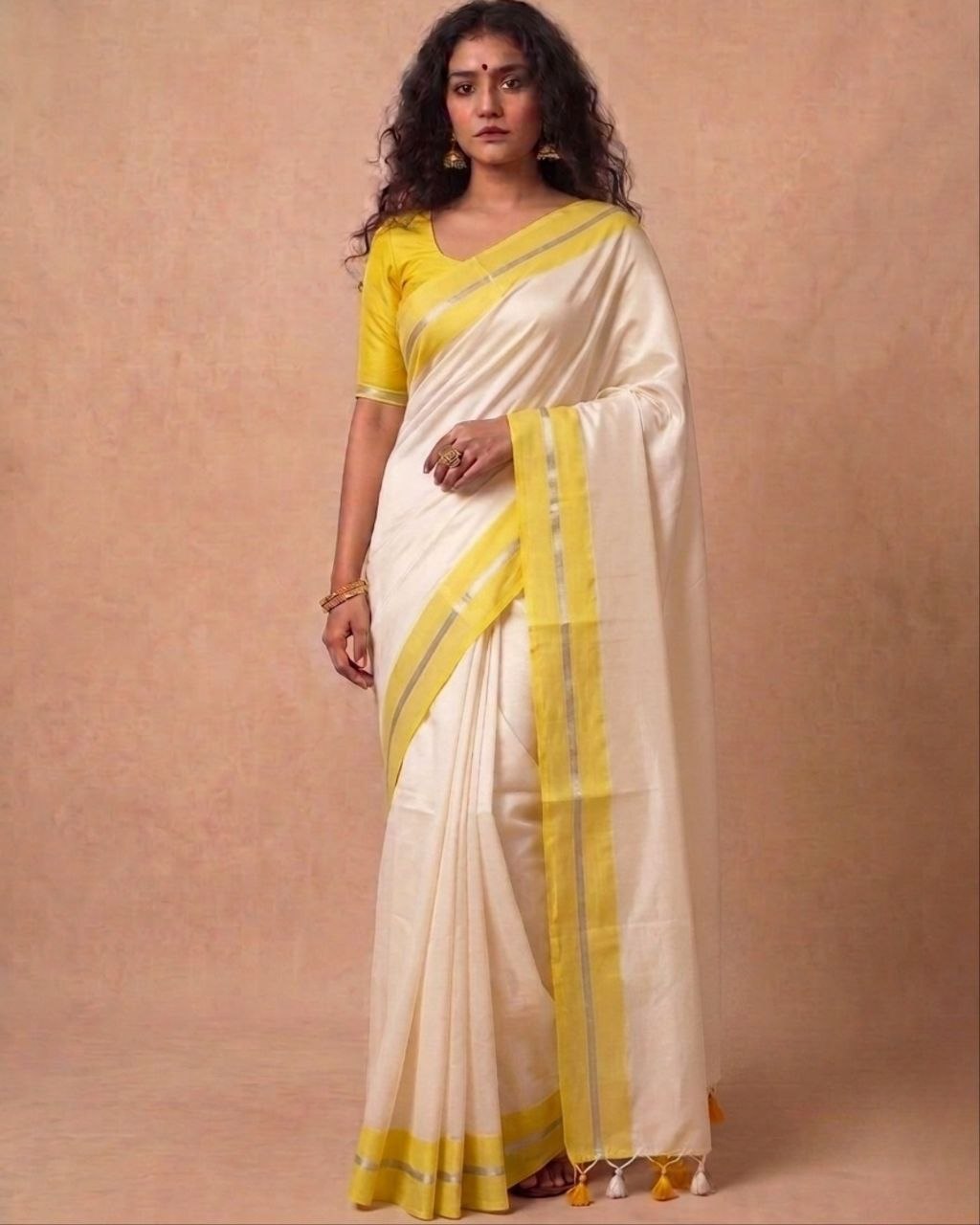 White mulmul cotton saree yellow border