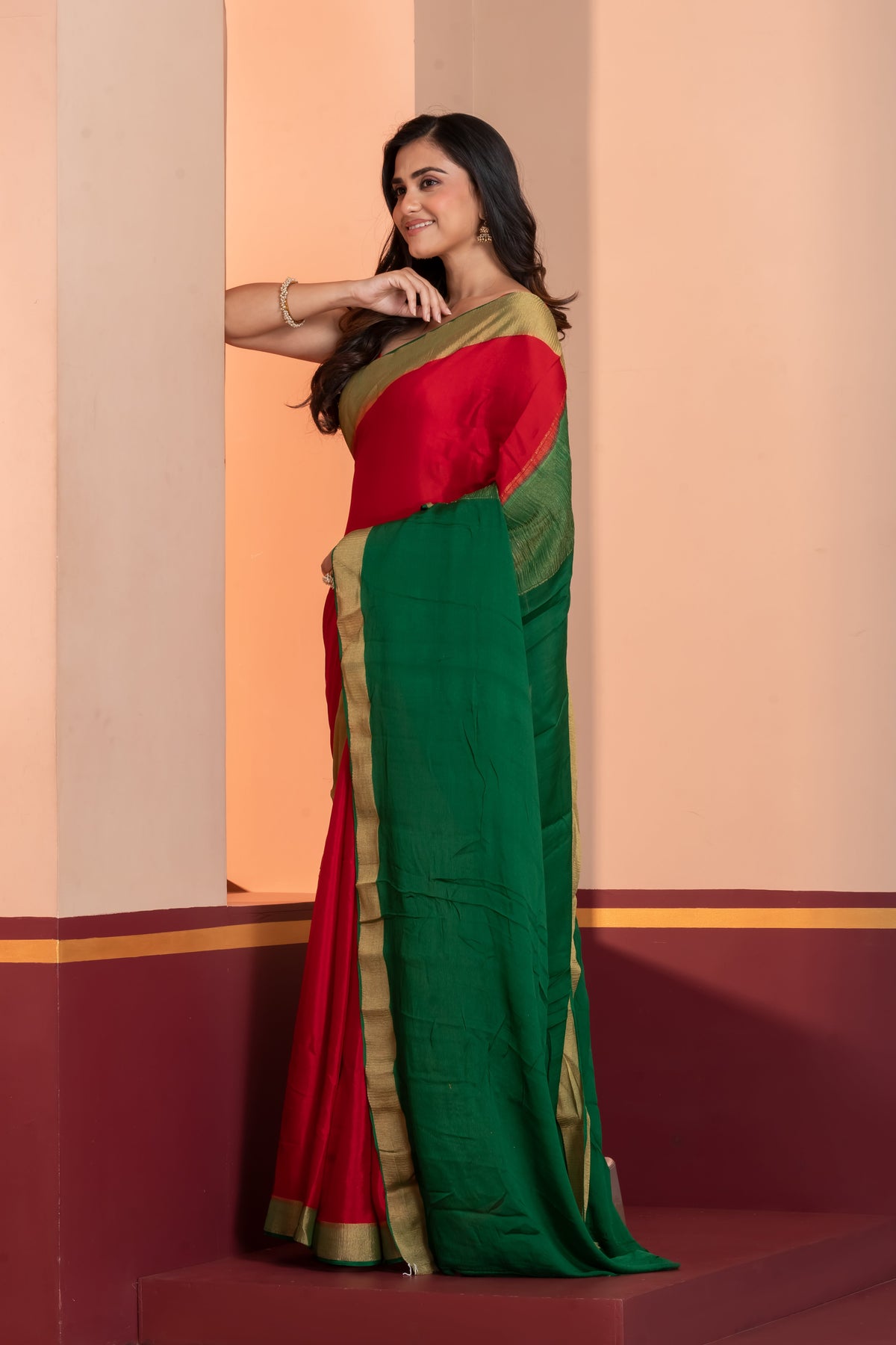 Bright red pure crepe silk zari border saree