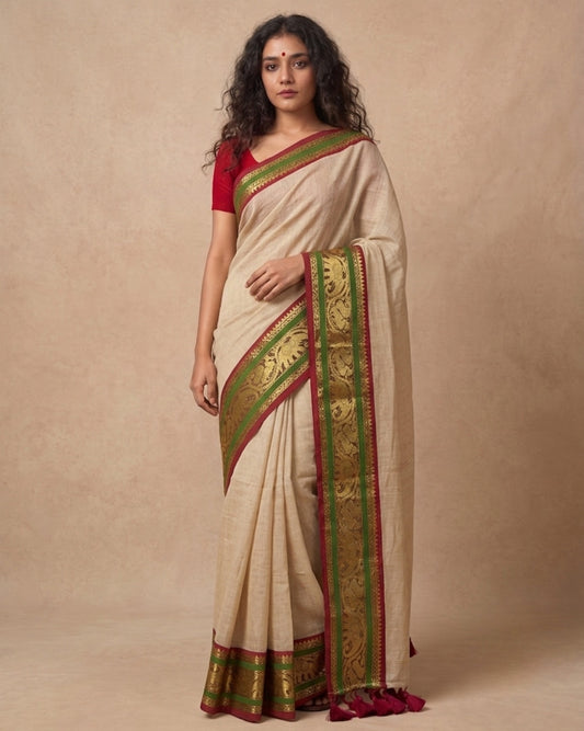 Off white green zari border mulmul saree