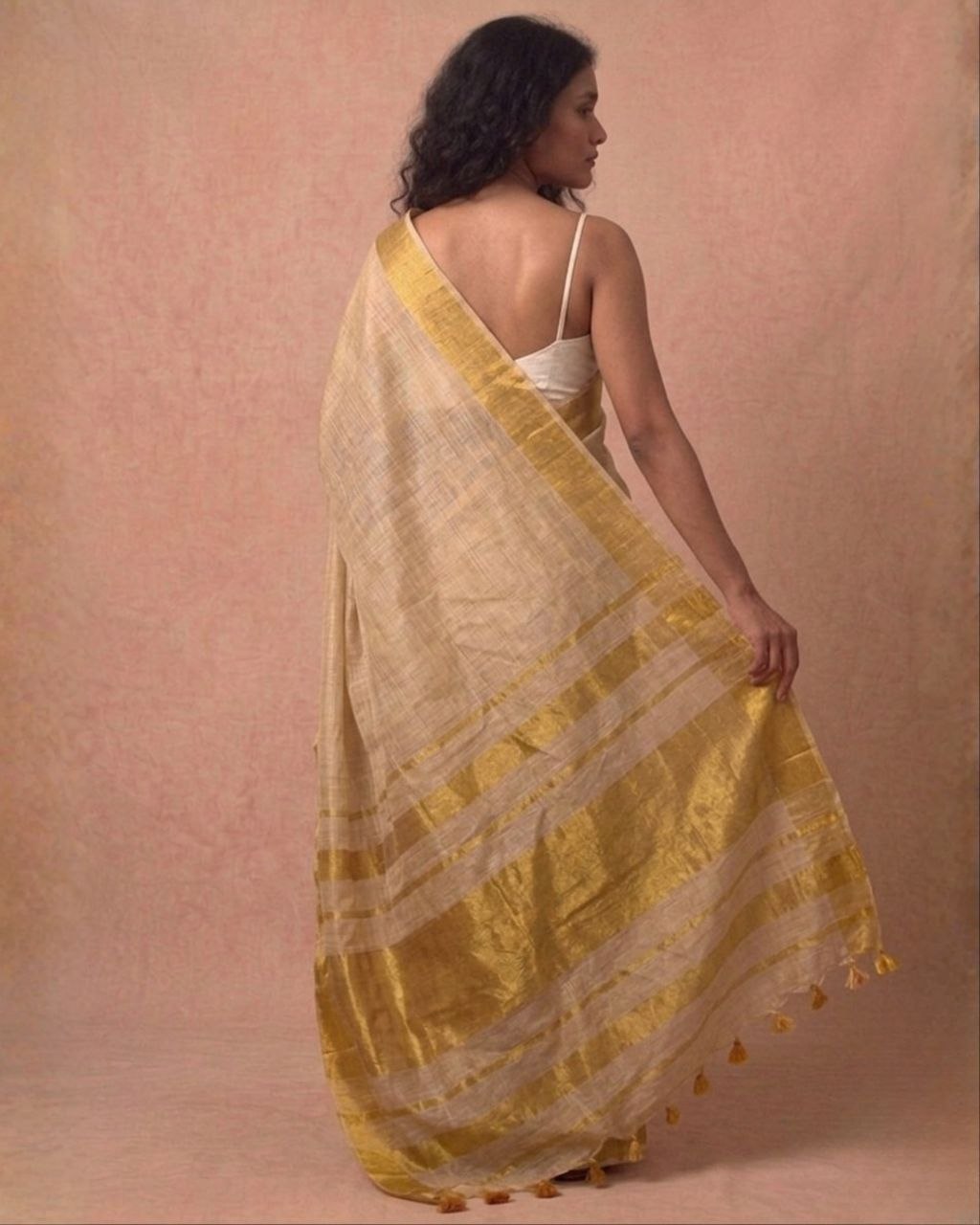 Offwhite golden zari border tissue kasavu saree