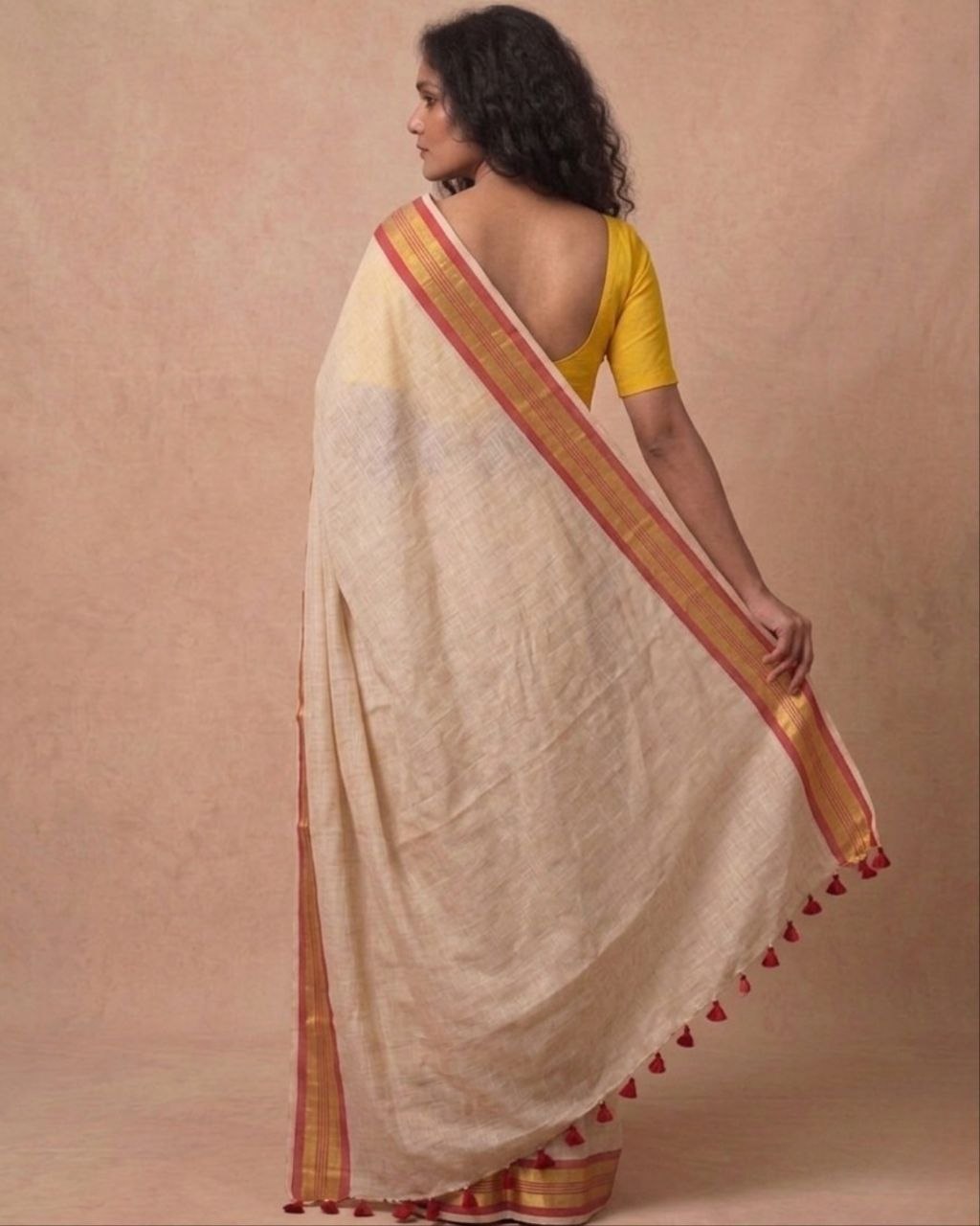 Off white red zari border mulmul saree