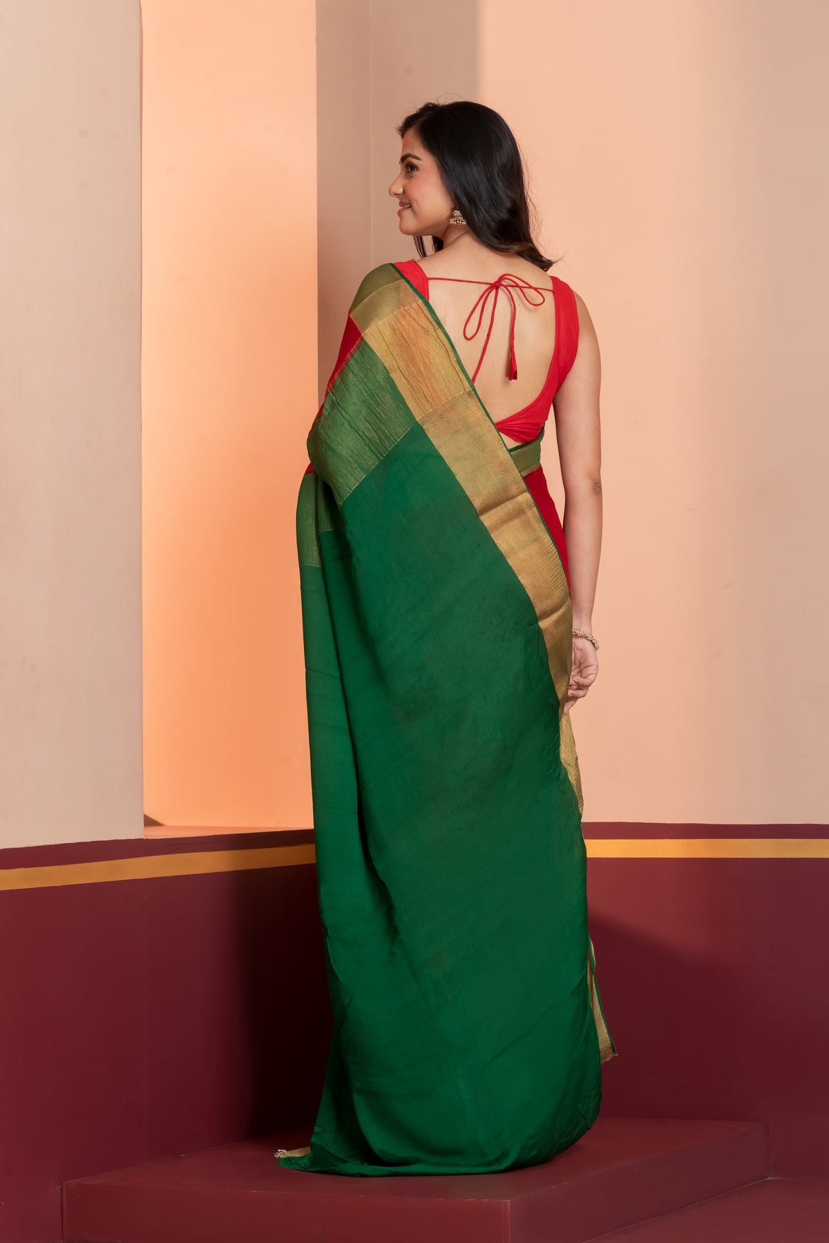 Bright red pure crepe silk zari border saree
