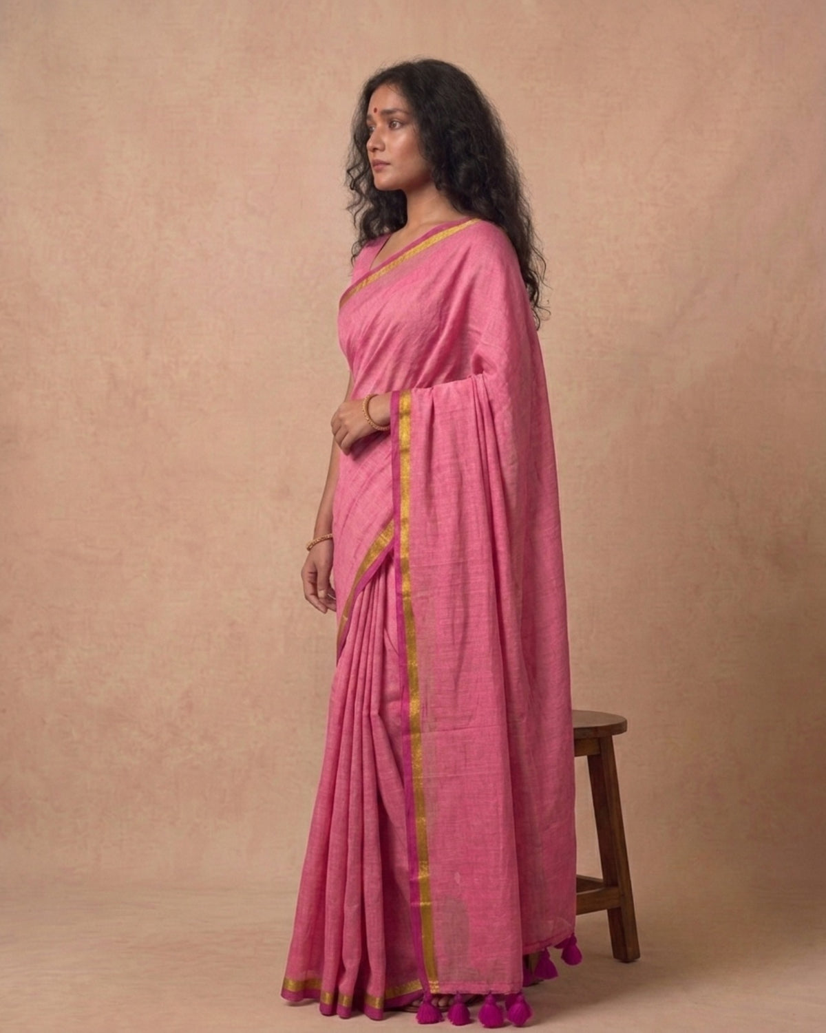 Pink mulmul cotton saree with gold and red border